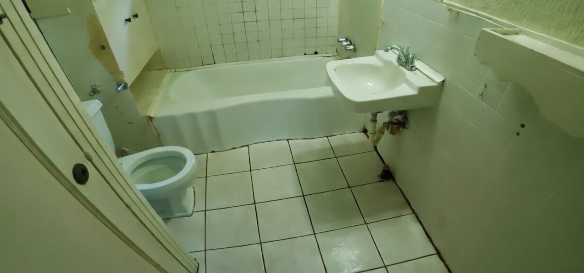 Sanitization crew performing deep cleaning and disinfection in a contaminated interior space