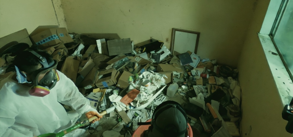 Compassionate Hoarding Cleanup Houston, Tx 1 Professional hoarding cleanup in a severely cluttered room