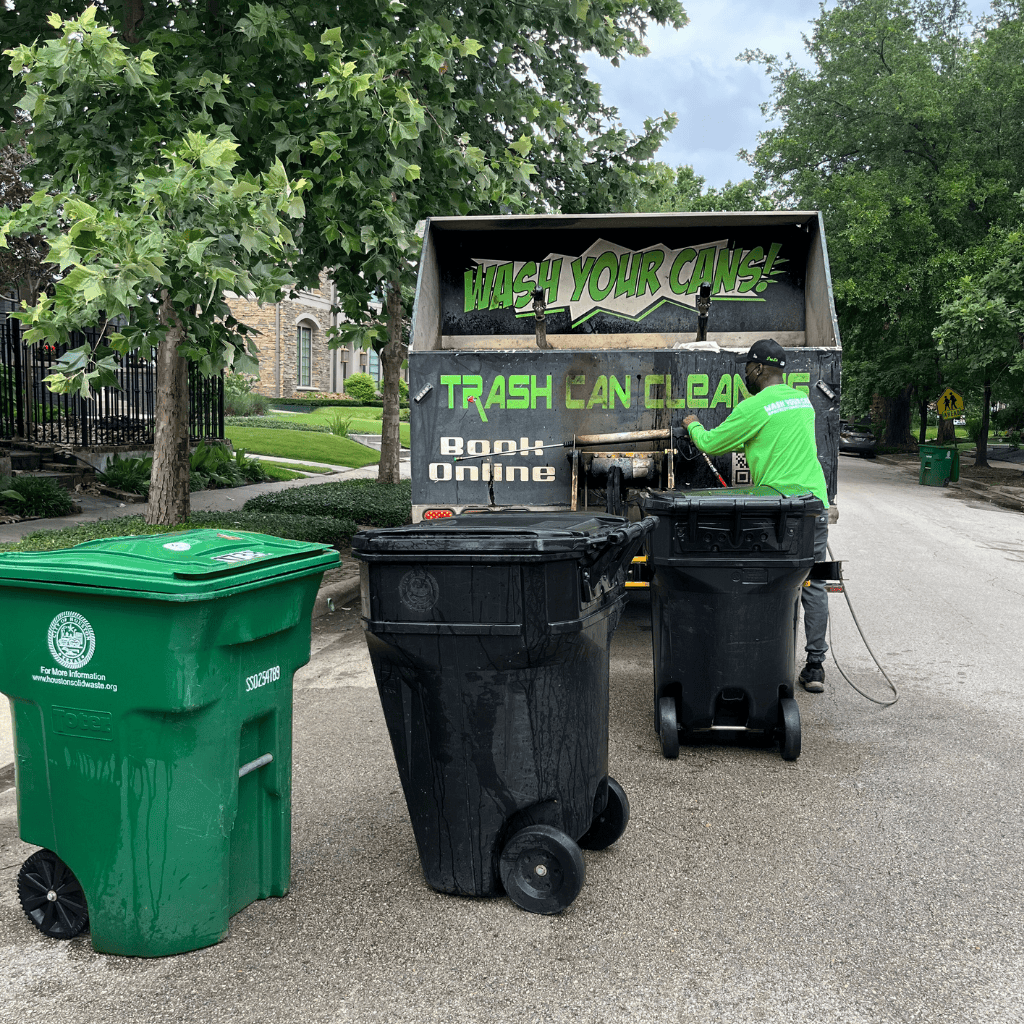 Professional cleaning service for residential trash cans, showcasing a worker in a green uniform sanitizing black and green bins with a specialized truck labeled "Trash Can Cleaning."
